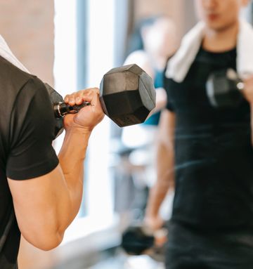 A man is losing weight in a gym